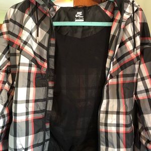 Nike track jacket.  Ladies Small 100% polyester.